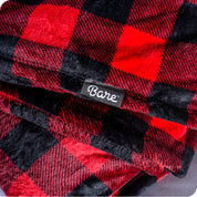 Close up of a plaid microplush blanket