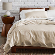 A modern bed with a organic cotton percale duvet cover on.