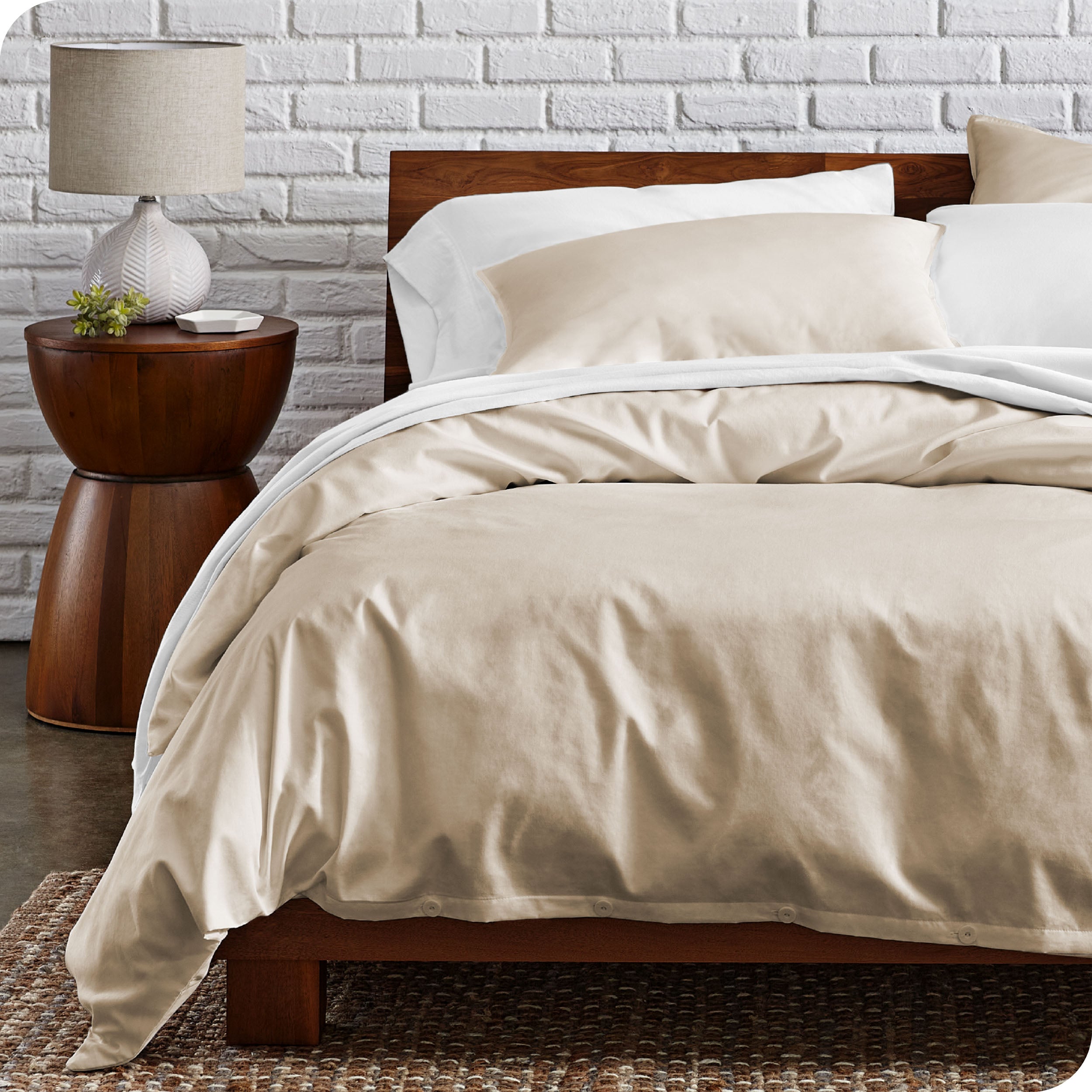A modern bed with a organic cotton percale duvet cover on.