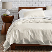 A modern bed with a organic cotton percale duvet cover on.
