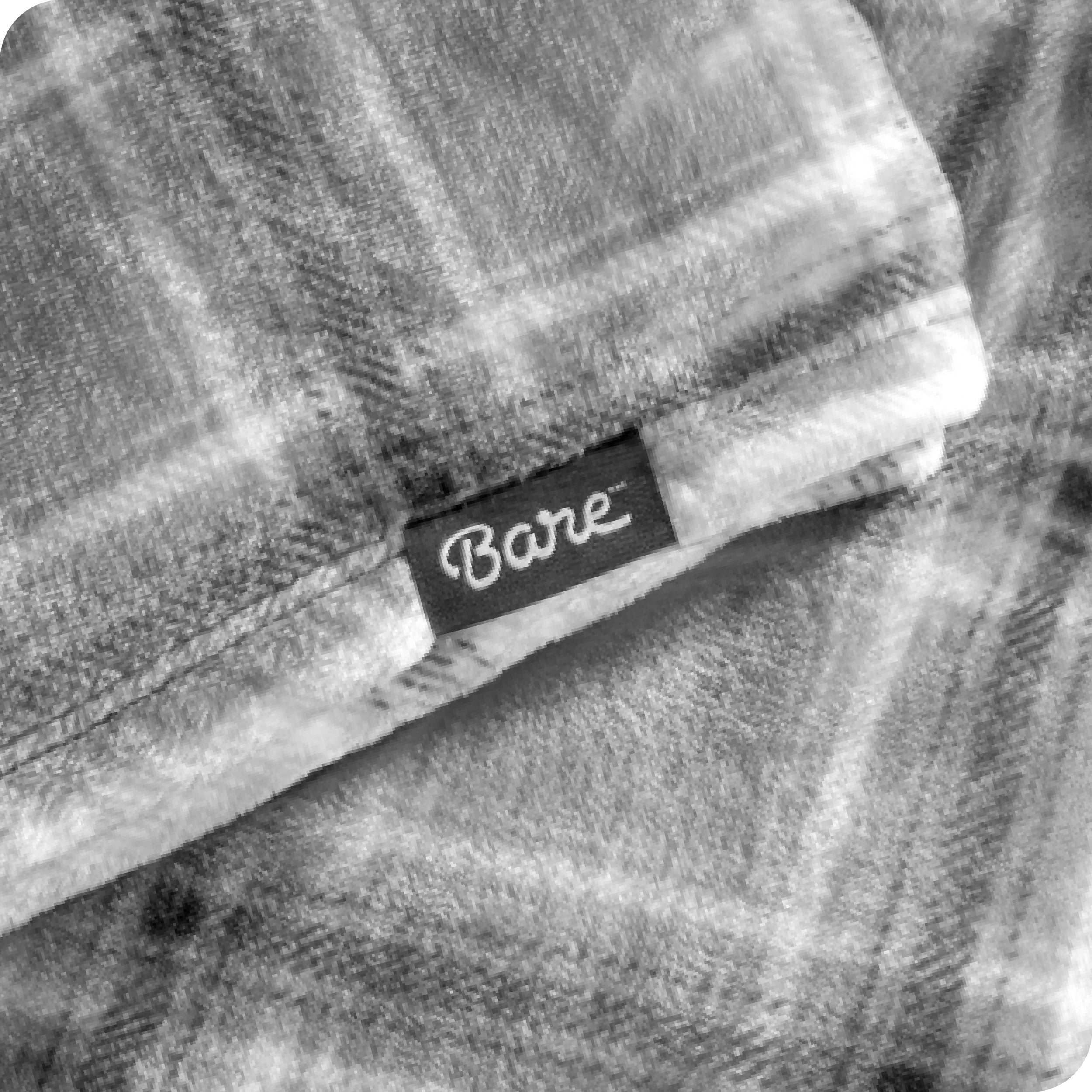 Close up of a plaid microplush blanket
