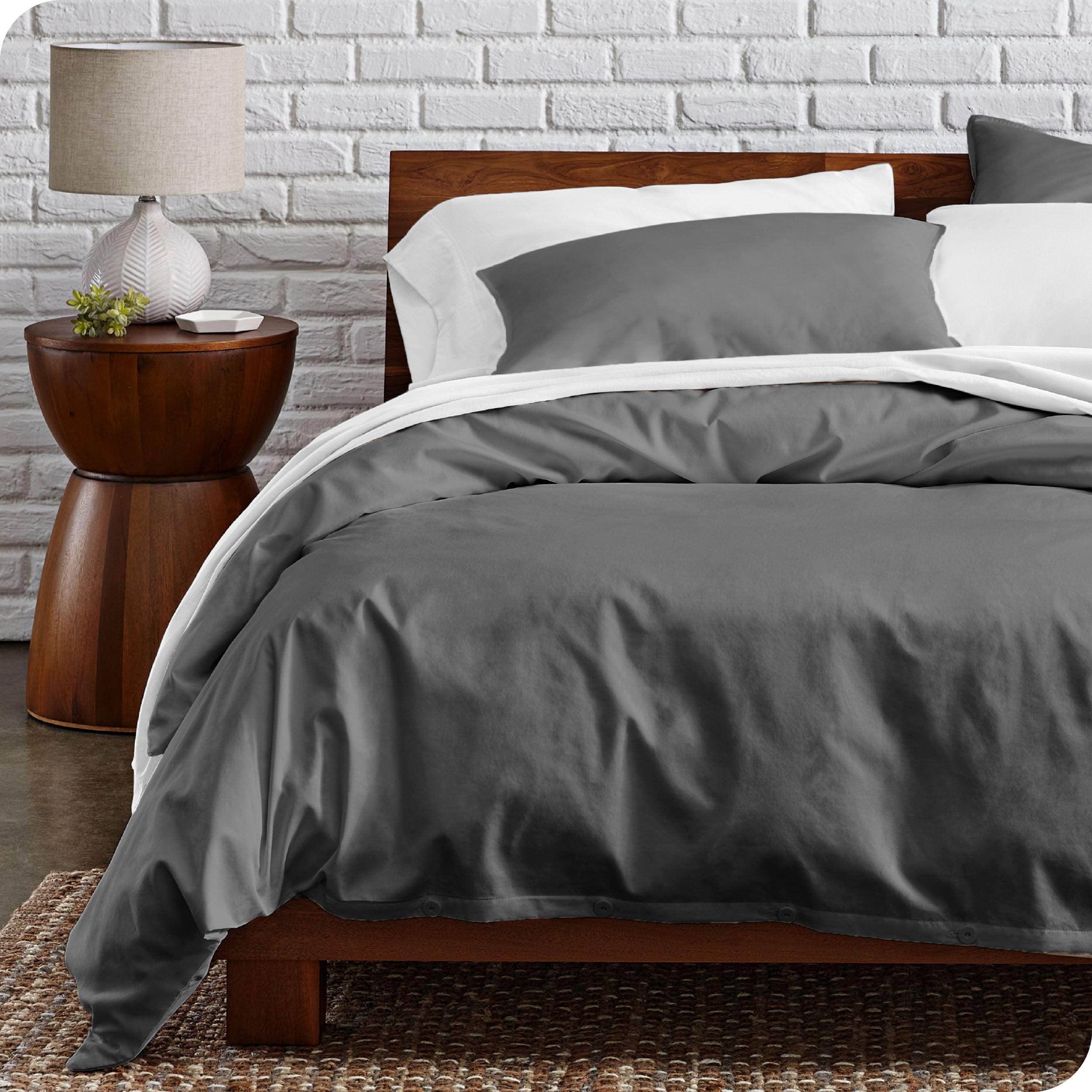 A modern bed with a organic cotton percale duvet cover on.