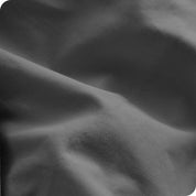 A close view of the oraganic cotton percale duvet cover showing the texture, color, and fabric.