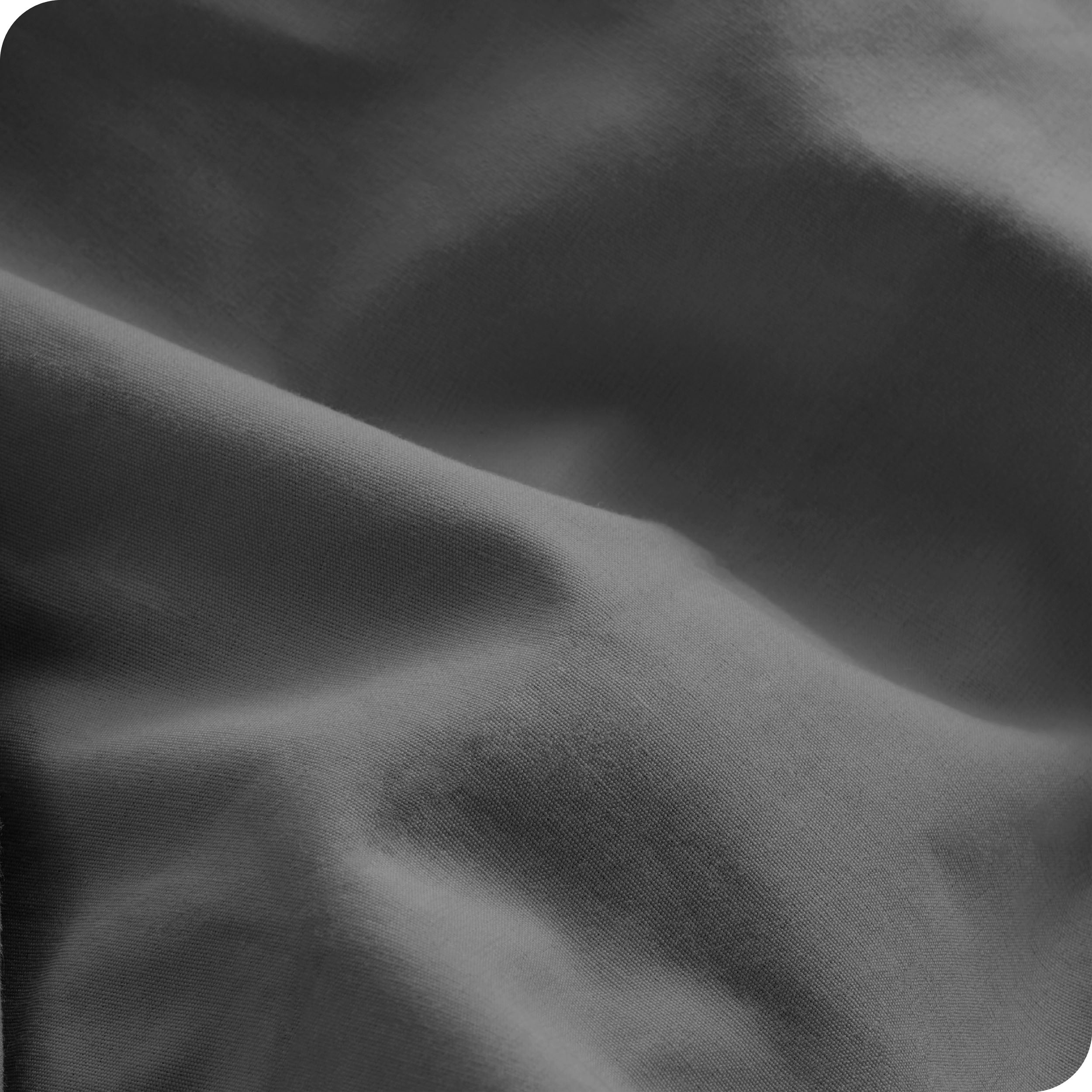 A close view of the oraganic cotton percale duvet cover showing the texture, color, and fabric.