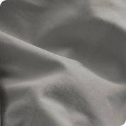 A close view of the oraganic cotton percale duvet cover showing the texture, color, and fabric.