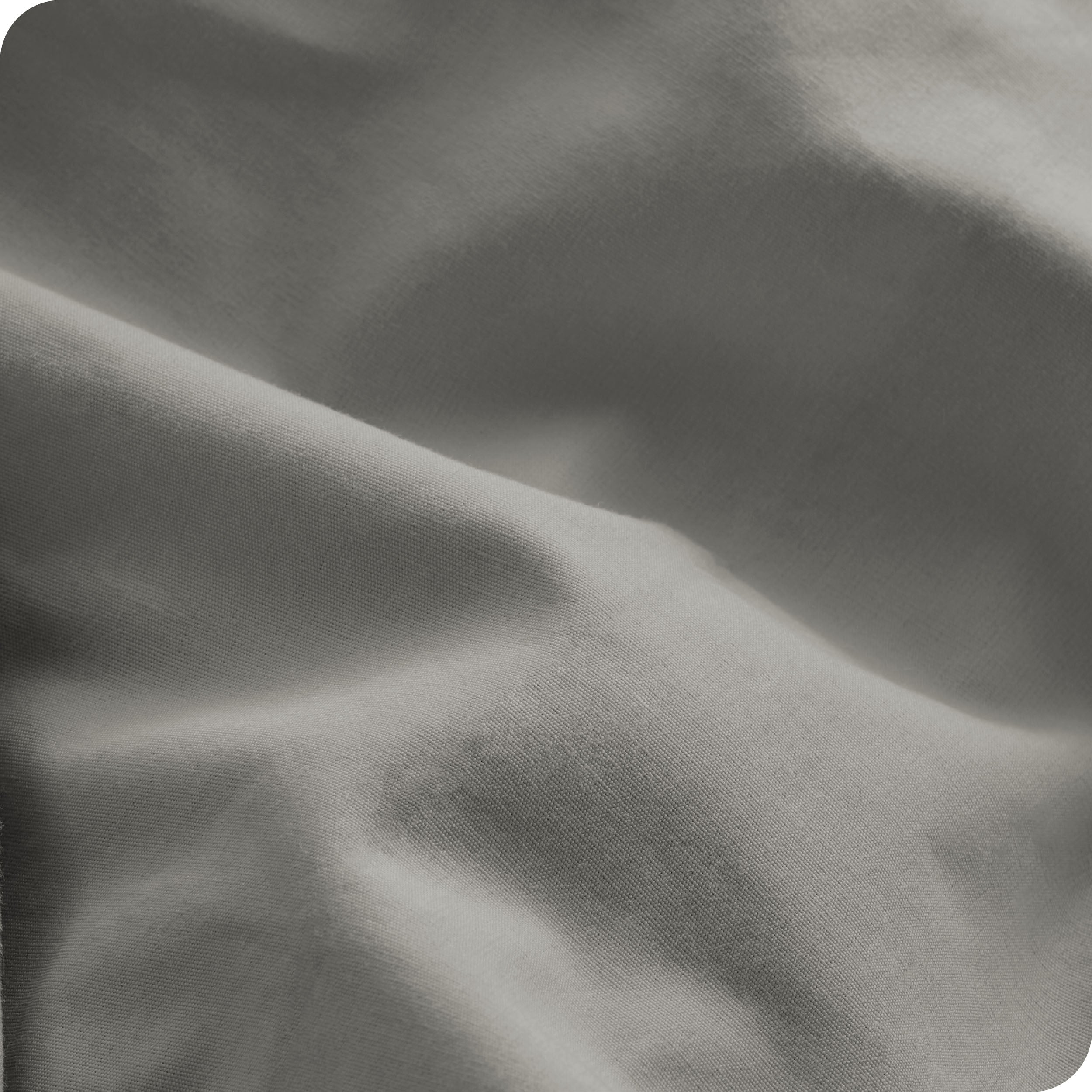A close view of the oraganic cotton percale duvet cover showing the texture, color, and fabric.